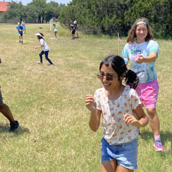 campers playing with water balloons