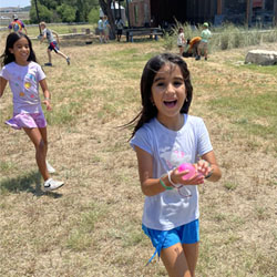 campers playing with water balloons