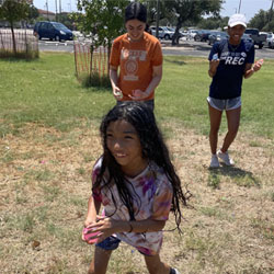 campers playing with water balloons