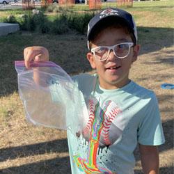 camper displaying insect bag