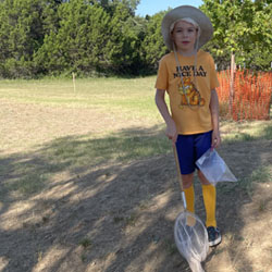 camper catching insects