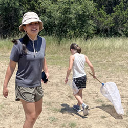 camper catching insects