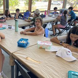 campers making insect boxes