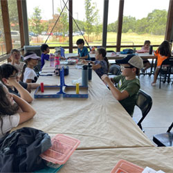 campers making insect boxes