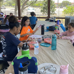 campers making insect boxes