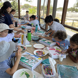 campers making insect boxes