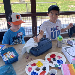 campers making insect boxes