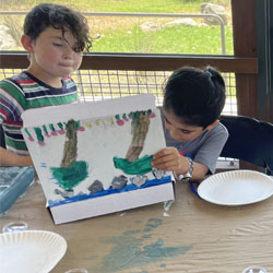 campers making insect boxes