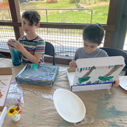 campers making insect boxes