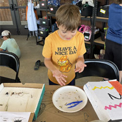 camper making insect box