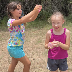 campers playing with water balloons