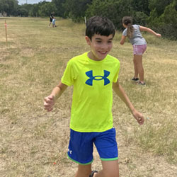 campers playing with water balloons