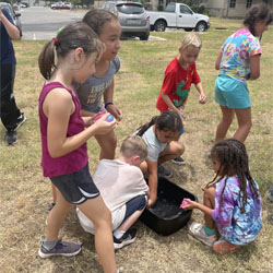 campers playing with water balloons