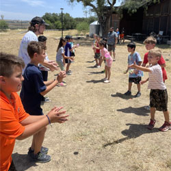 campers playing with water balloons