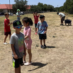 campers playing with water balloons