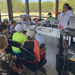 presenter talking to campers