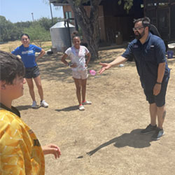 campers playing with water balloons