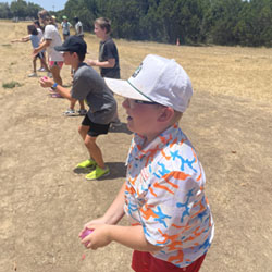 campers playing with water balloons