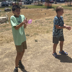 campers playing with water balloons