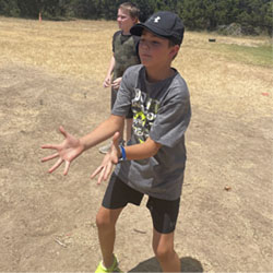 campers playing with water balloons