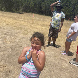 campers playing with water balloons