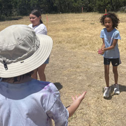 campers playing with water balloons