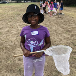 camper holding insect net