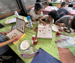 campers making insect boxes