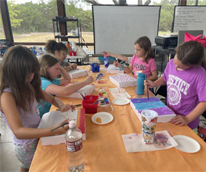 campers making insect boxes