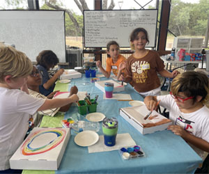 campers making insect boxes