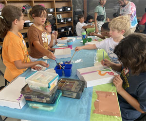 campers making insect boxes