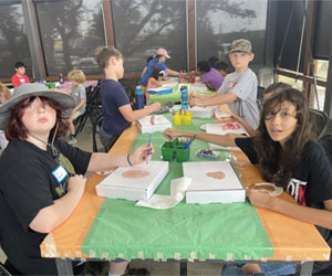 campers making insect boxes