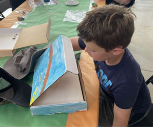 camper making insect box