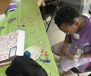 camper making insect box