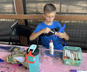 camper making insect model