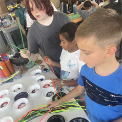 campers making bead key chains