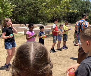 campers playing with water balloons