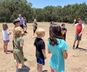 campers playing with water balloons