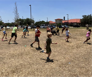 campers playing with water balloons