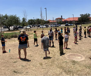 campers playing with water balloons