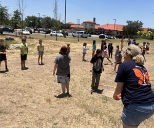 campers playing with water balloons