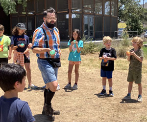 campers playing with water balloons