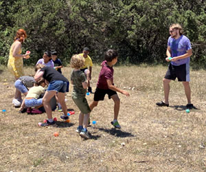 campers playing with water balloons