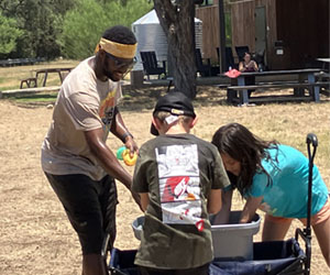 campers playing with water