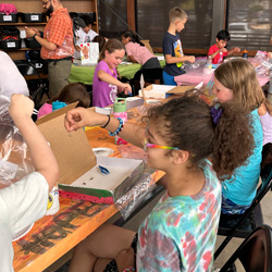 campers making insect boxes