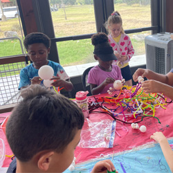 campers making insect models