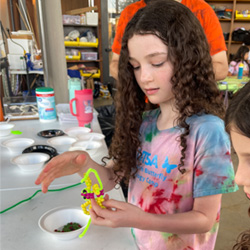 camper making bead key chain