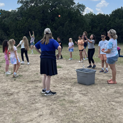 campers playing with water balloons