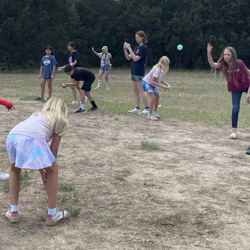 campers playing with water balloons