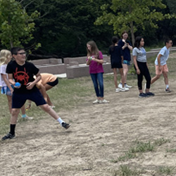 campers playing with water balloons